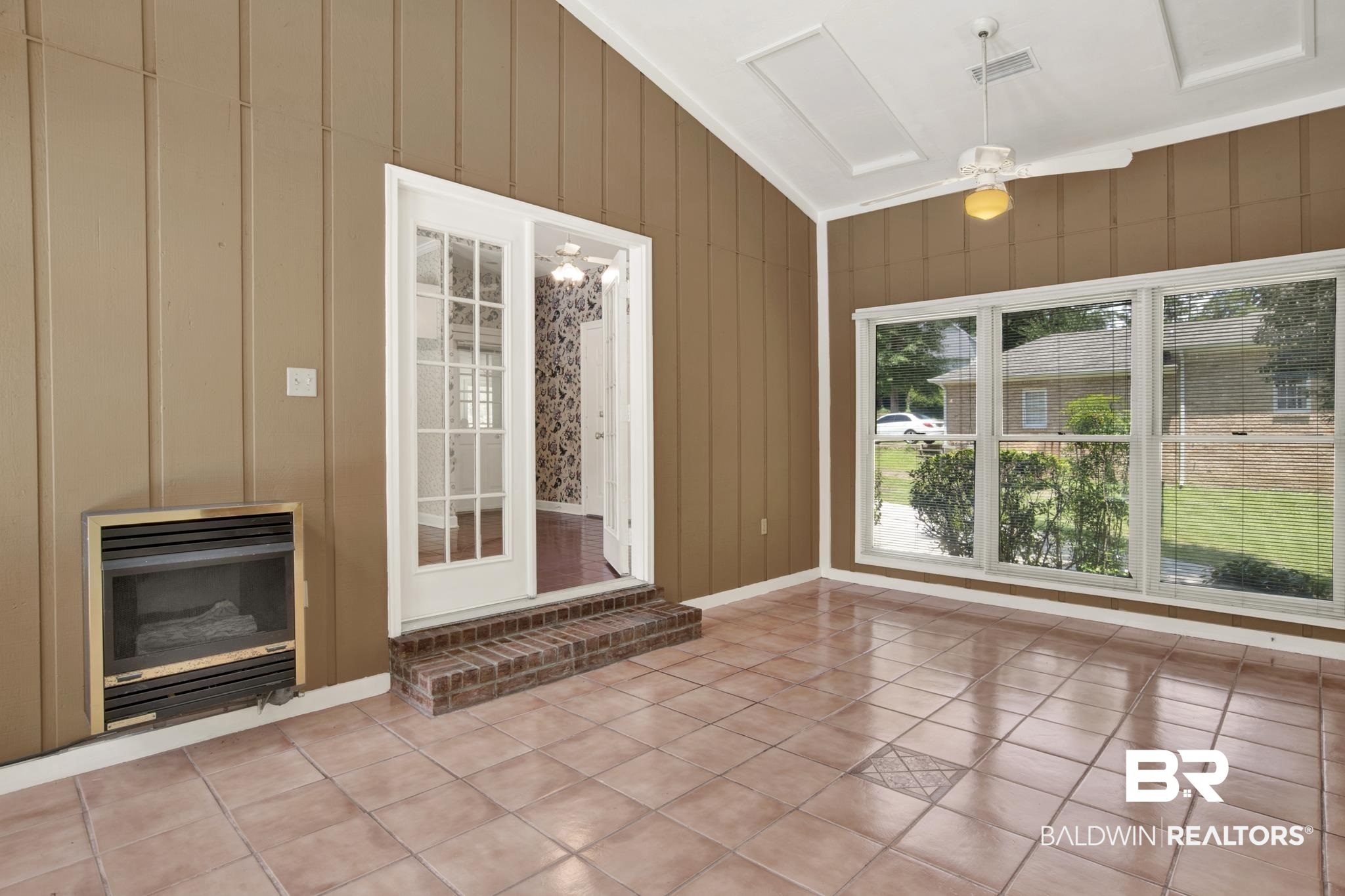 6805 Hunters Court Mobile, AL 36695 - Photo 33 of 37 Unfurnished sunroom with lofted ceiling