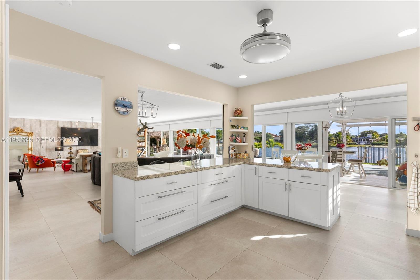 6830 Winged Foot Drive Hialeah, FL 33015 - Photo 11 of 28 a kitchen with sink and cabinets