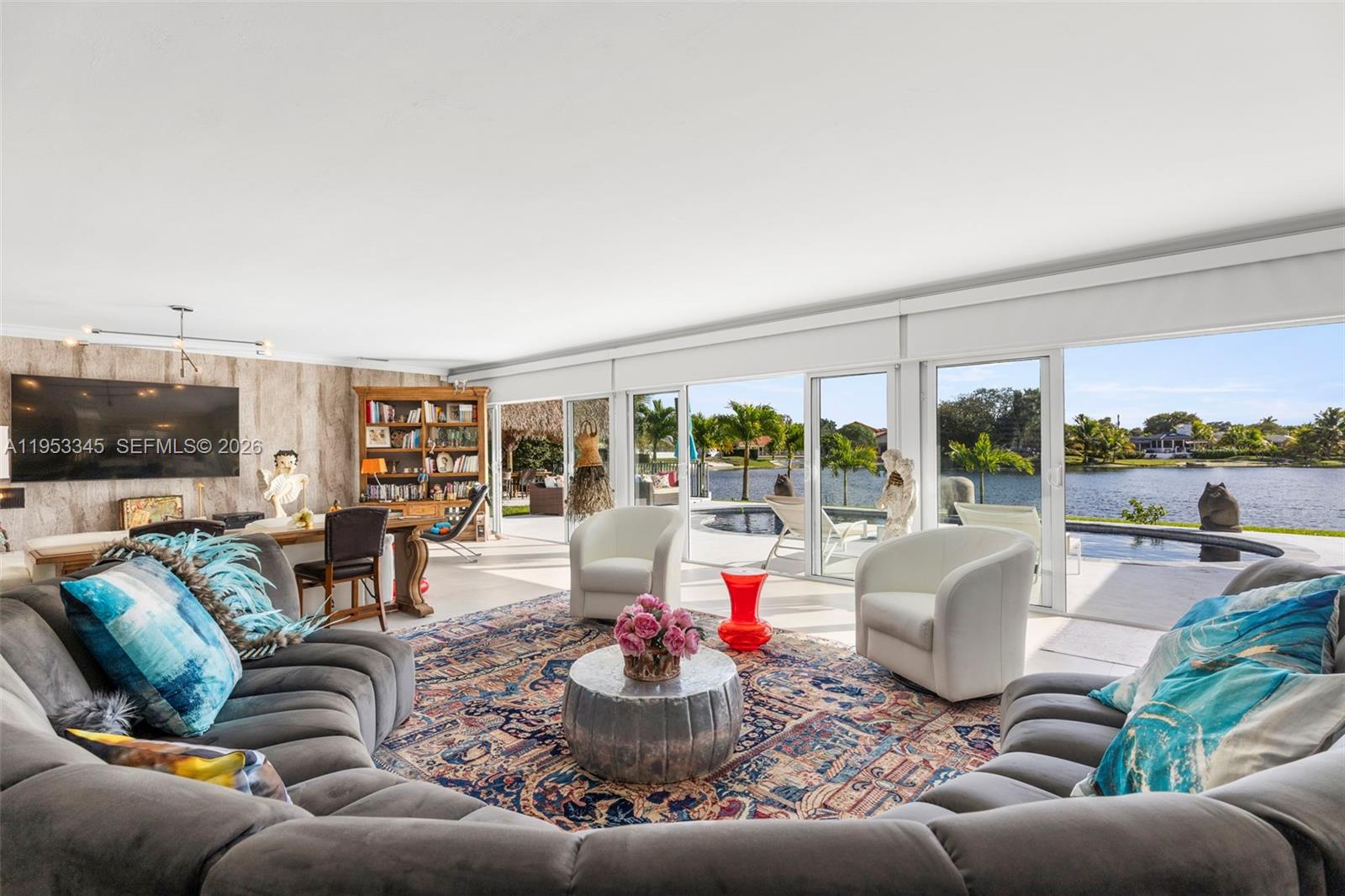 6830 Winged Foot Drive Hialeah, FL 33015 - Photo 20 of 28 a living room with furniture and a large window