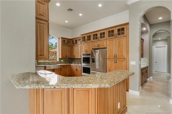 $1,249,000 | 5628 Southwest Gray Fox Drive, Palm City, FL 34990