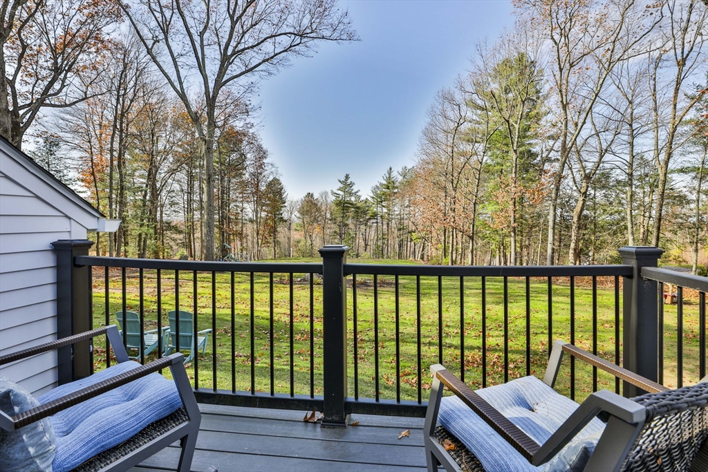 60 Bolton Road Harvard, MA 01451 - Photo 14 of 30 a view of a balcony with wooden floor and fence