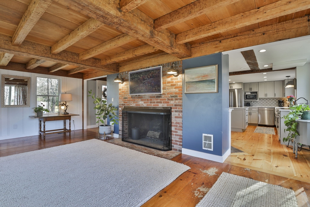 60 Bolton Road Harvard, MA 01451 - Photo 8 of 30 a living room with furniture and a fireplace