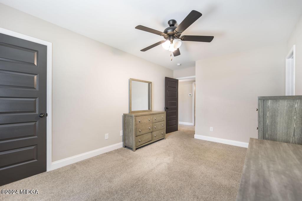 135 Timber Ridge Boulevard Byron, GA 31008 - Photo 28 of 36 a view of an empty room and window