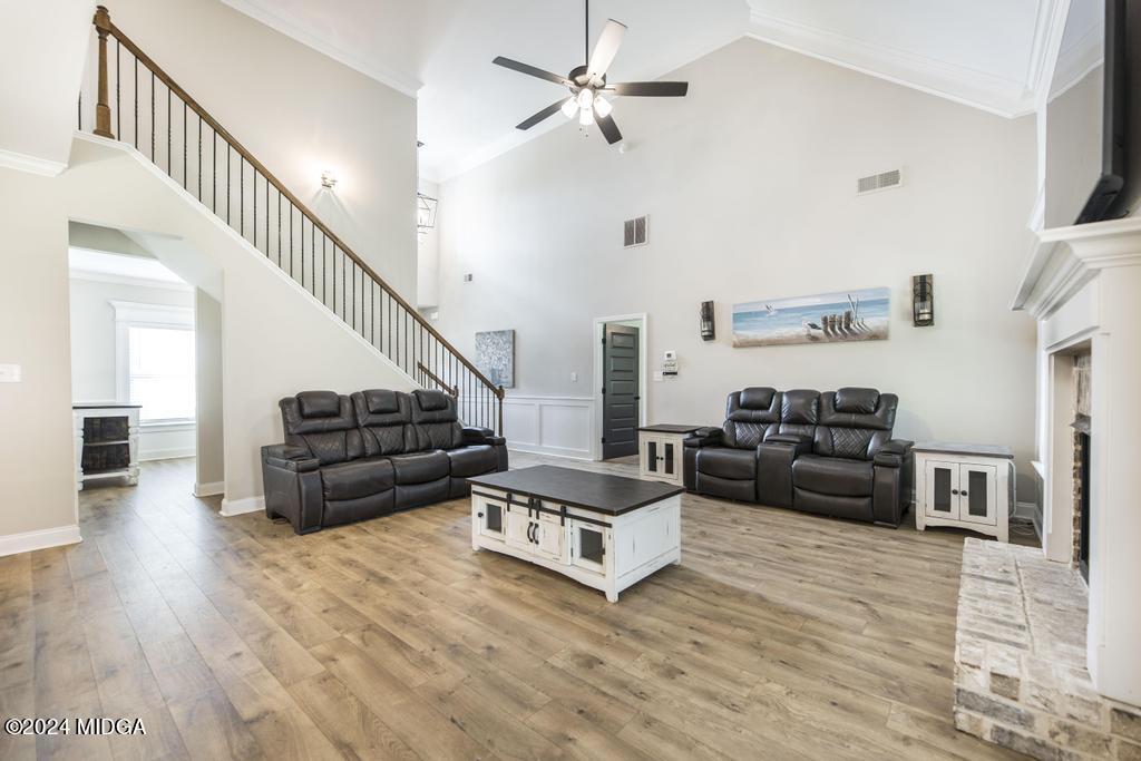 135 Timber Ridge Boulevard Byron, GA 31008 - Photo 8 of 36 a living room with furniture and wooden floor