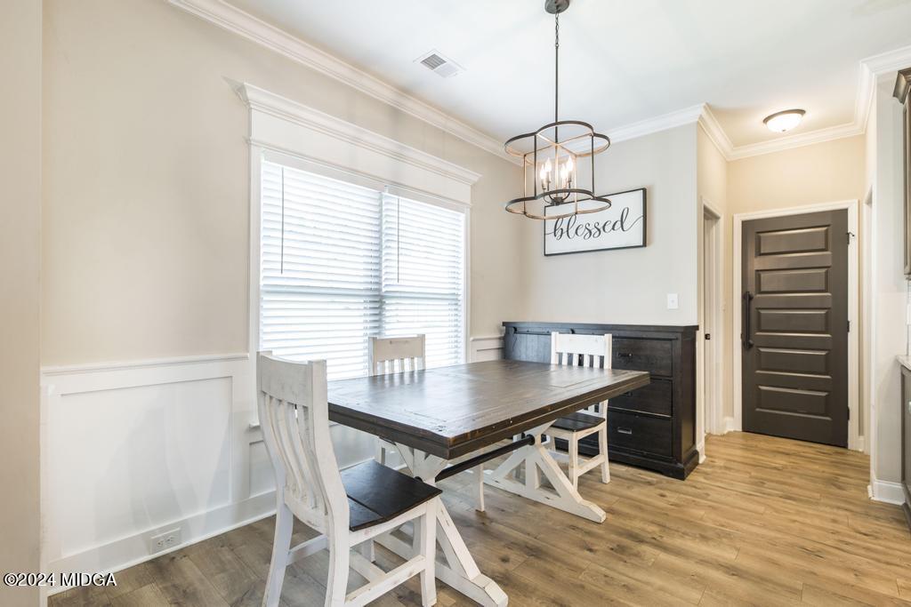 135 Timber Ridge Boulevard Byron, GA 31008 - Photo 10 of 36 a view of a dining room with furniture window and wooden floor