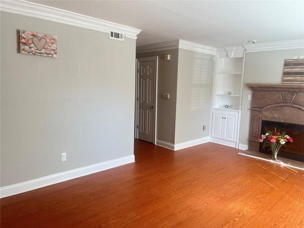 4430 Tilly Mill Road, Unit 104 Dunwoody, GA 30360 - Photo 12 of 37 a view of a livingroom with a fireplace