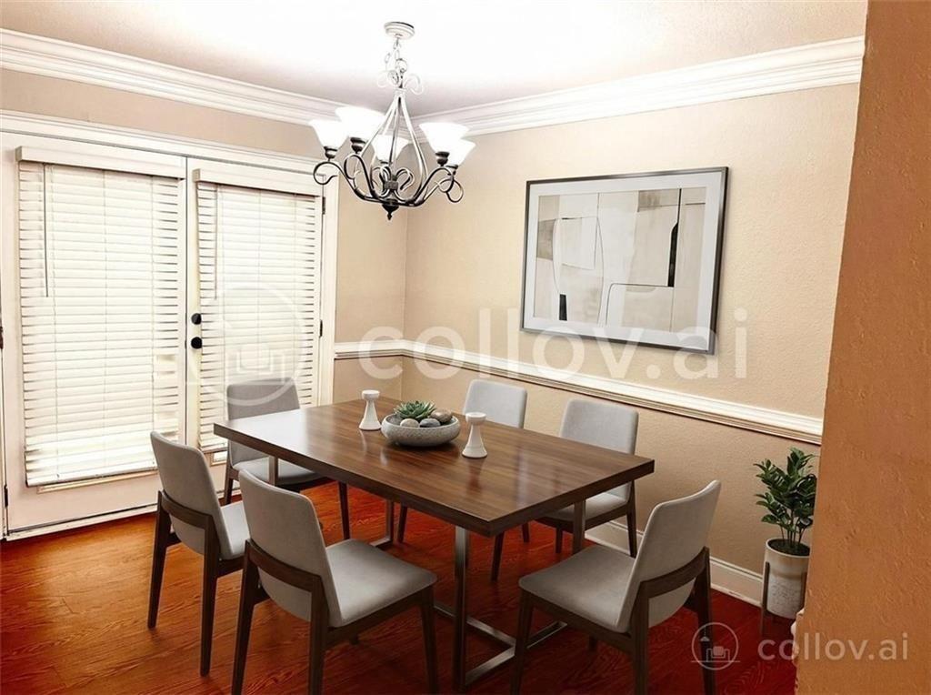 4430 Tilly Mill Road, Unit 104 Dunwoody, GA 30360 - Photo 15 of 37 a view of a dining room with furniture window and wooden floor