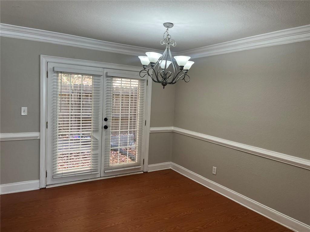 4430 Tilly Mill Road, Unit 104 Dunwoody, GA 30360 - Photo 21 of 37 a view of an empty room with a window