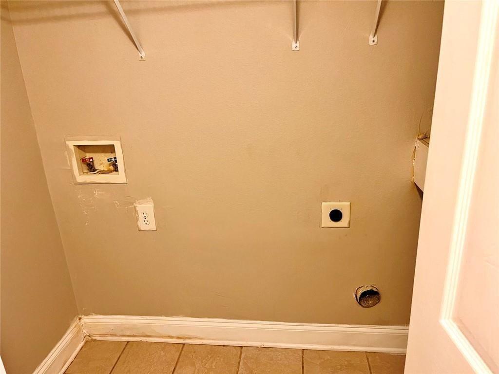 4430 Tilly Mill Road, Unit 104 Dunwoody, GA 30360 - Photo 35 of 37 a bathroom with a tub