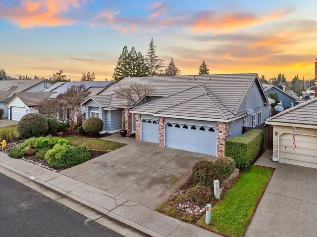 a house view with a garden space