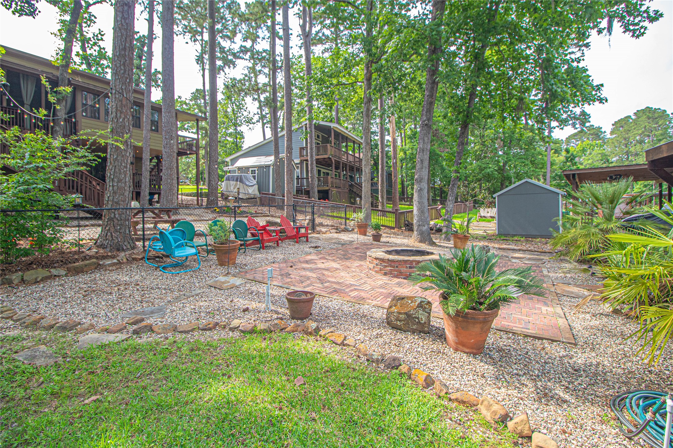 70 Lower Cove Drive Point Blank, TX 77364 - Photo 13 of 50 Another view of the fire pit staging area. ALL the chairs stay.