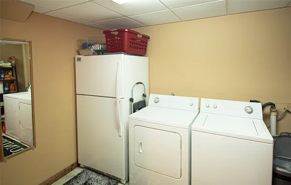 a utility room with dryer and washer