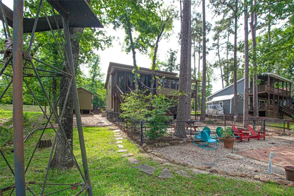 a backyard of a house with seating space