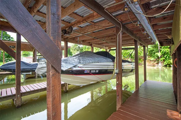 a view of swimming pool with a patio
