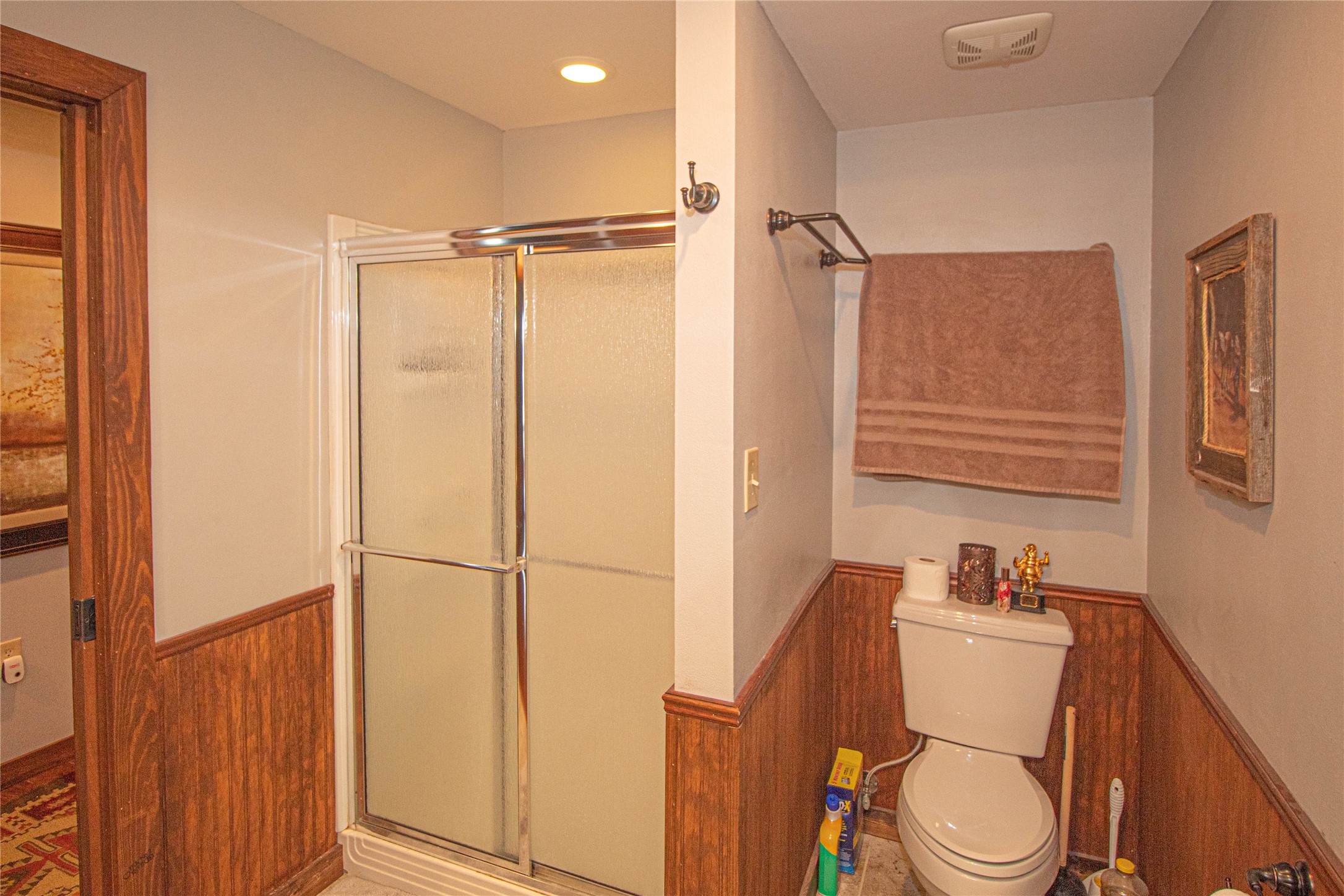 70 Lower Cove Drive Point Blank, TX 77364 - Photo 49 of 50 Standup shower in primary suite. Wainscoat wall treatment.