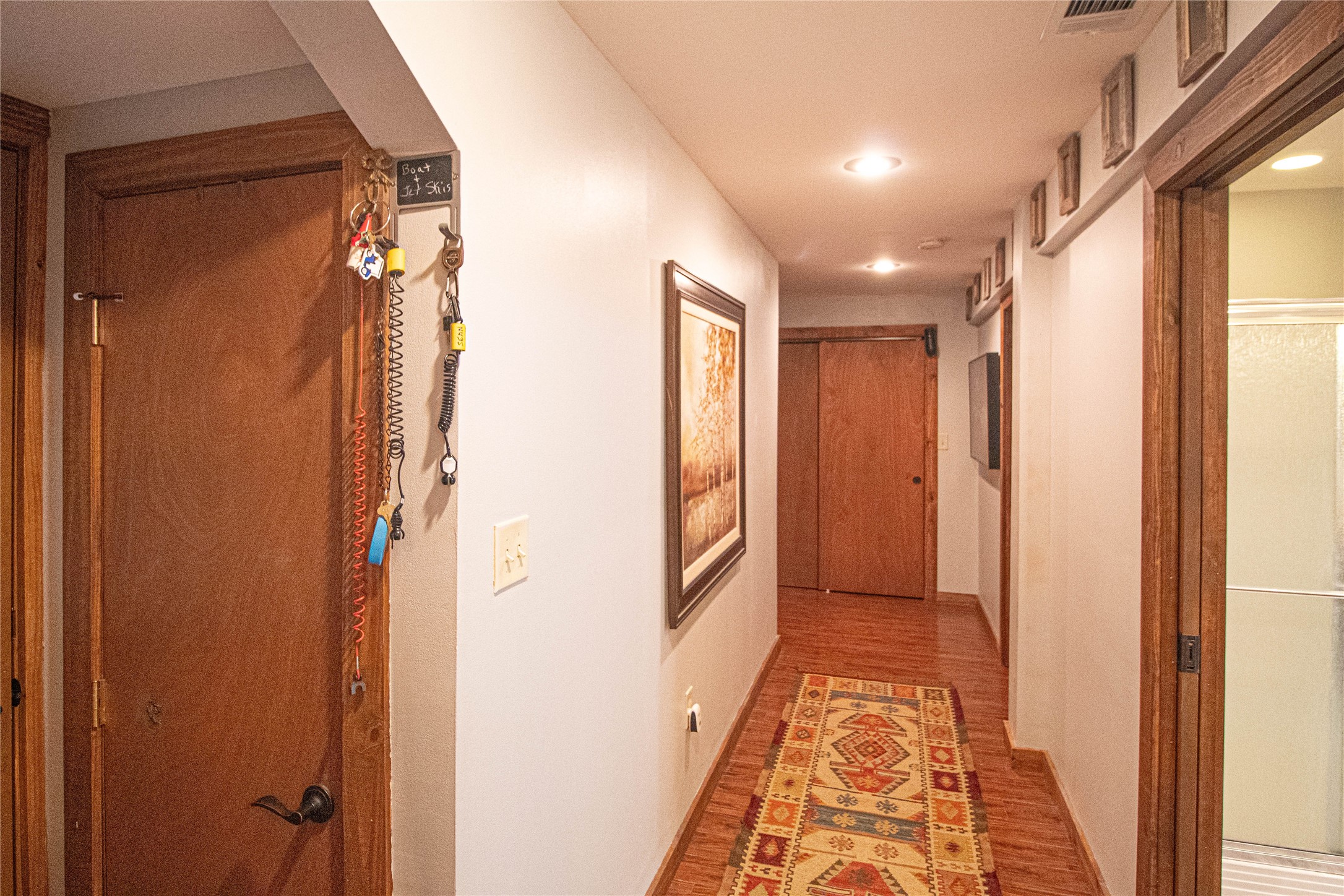 70 Lower Cove Drive Point Blank, TX 77364 - Photo 50 of 50 This home is unlike anything listed on the lake. Multiple staging areas in the outdoor area by the water, the ambience of wood floors throughout and privately set in a quiet neighborhood. EVERYTHING STAYS! Use as a Bed & Breakfast rental, as an investment or when you want to supplement your income when you are not using or retire to the perfect setting.