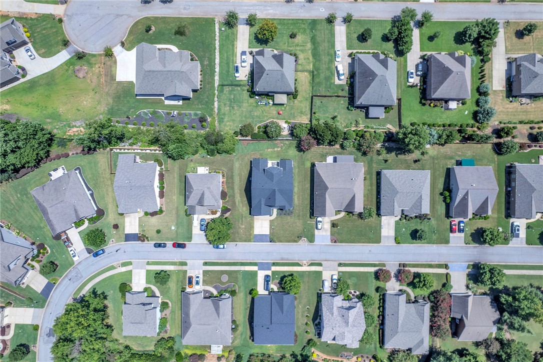 116 Stone Cottage Drive Anderson, SC 29621 - Photo 38 of 43 A bird's-eye view reveals structured suburban streets lined with neatly arranged homes and manicured lawns.