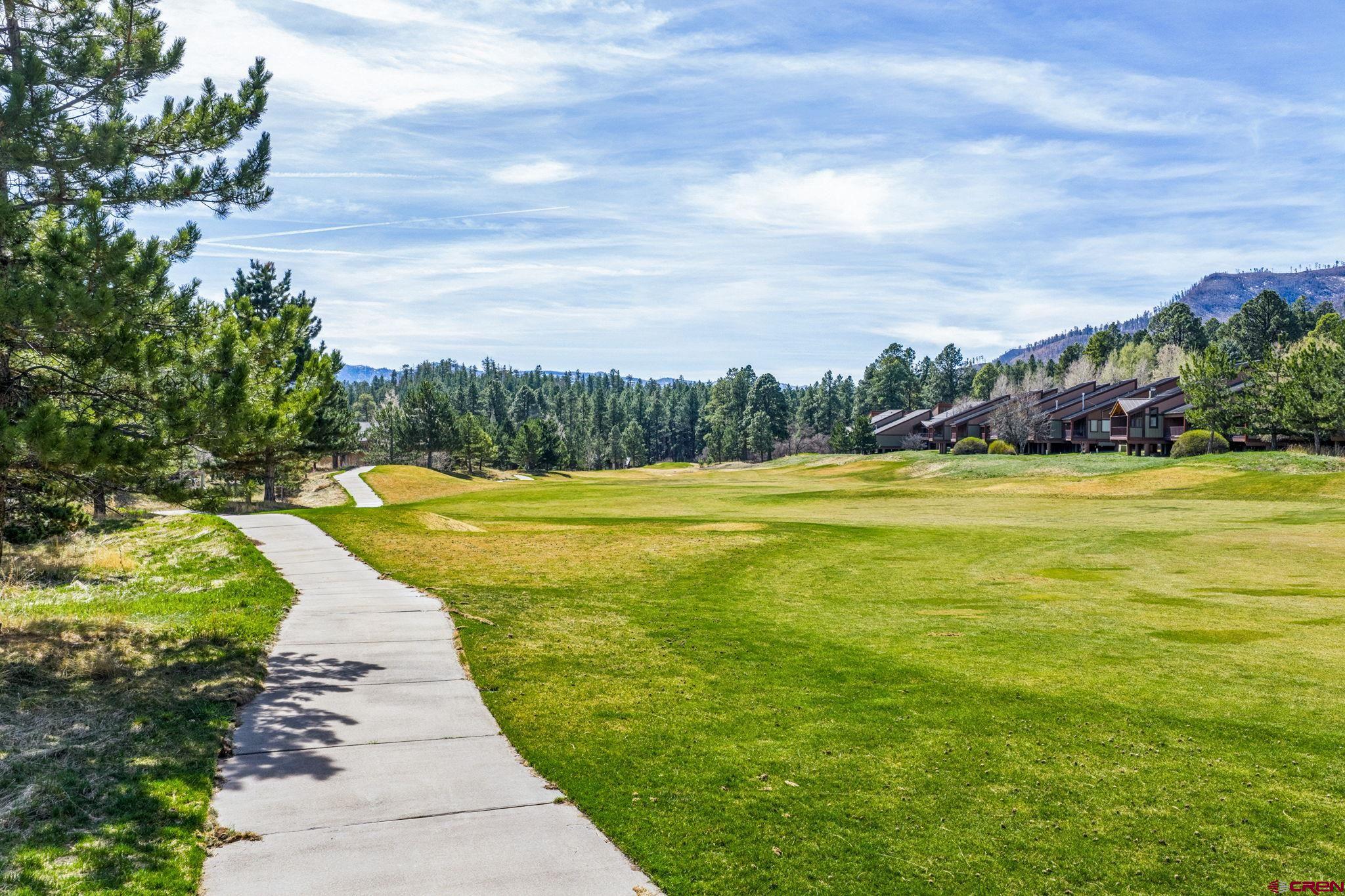 24 Cliffs Edge Drive Durango, CO 81301 - Photo 15 of 21 a view of a swimming pool with an outdoor seating