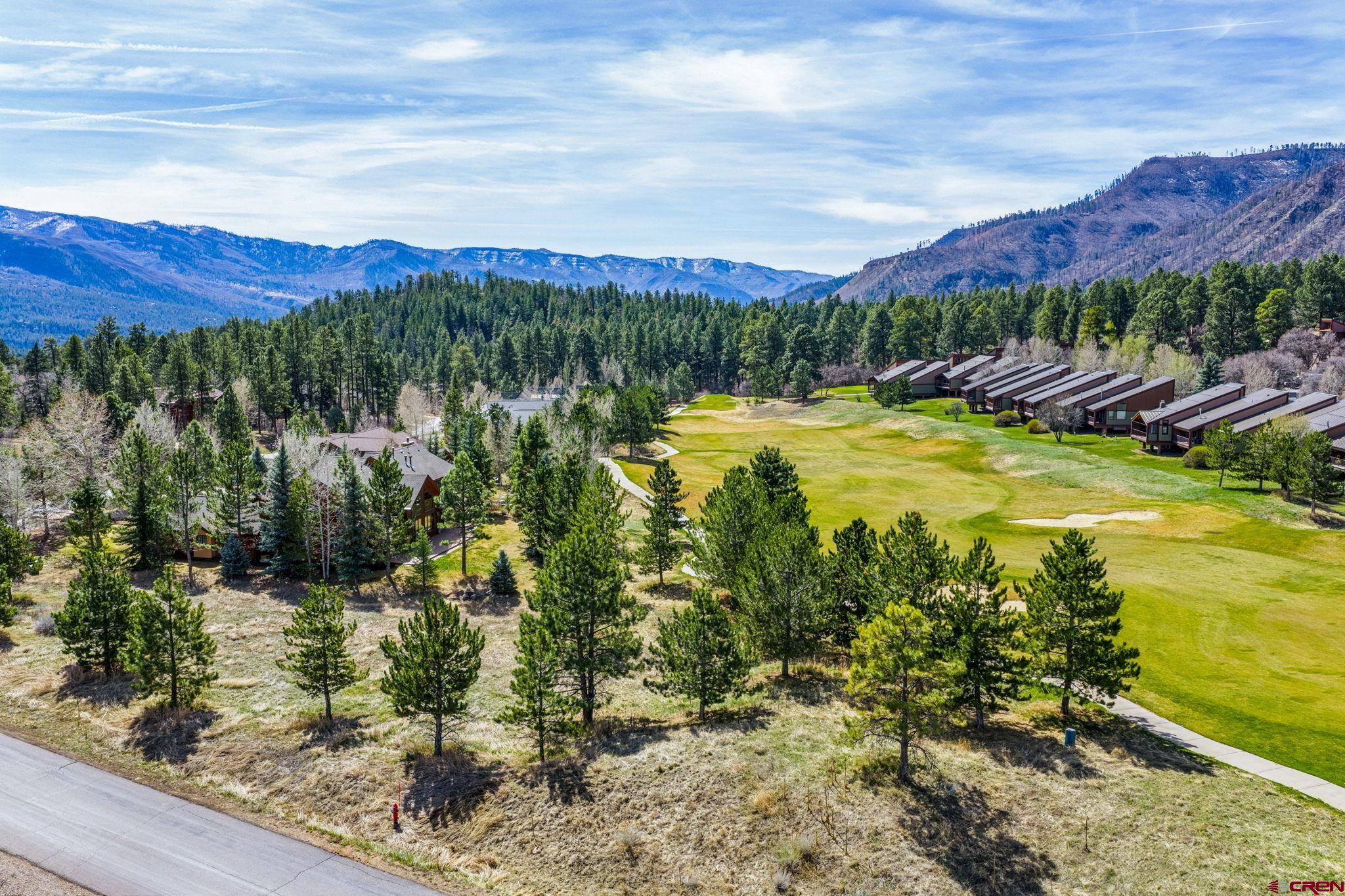 24 Cliffs Edge Drive Durango, CO 81301 - Photo 10 of 21 a view of a lake with a mountain in the background