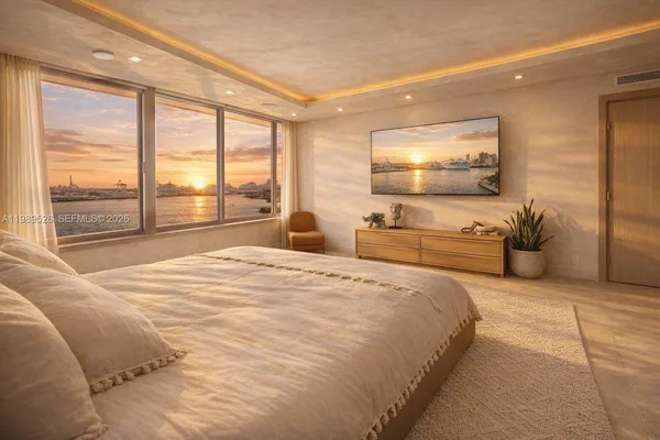a bedroom with a large bed and large windows