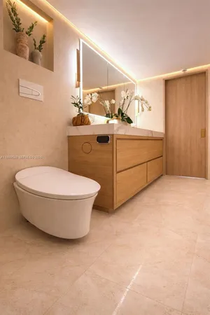 a room with a washing machine and sink