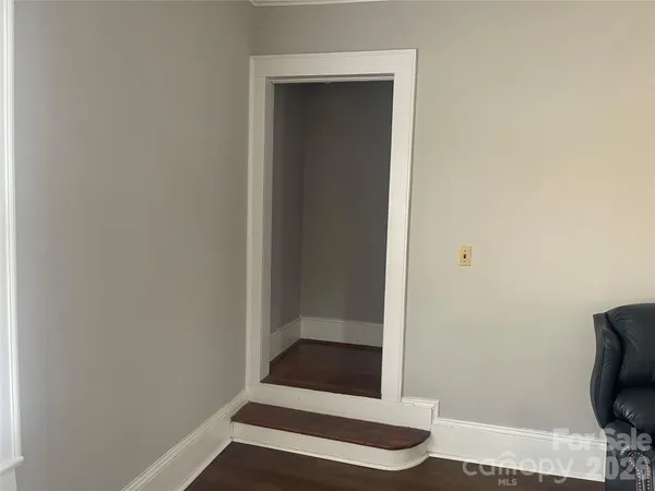 a view of entryway with wooden floor
