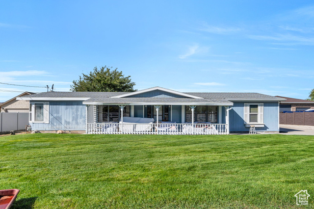 12958 South 300 East Draper, UT 84020 - Photo 32 of 38 Ranch-style house featuring a shingled roof and a porch