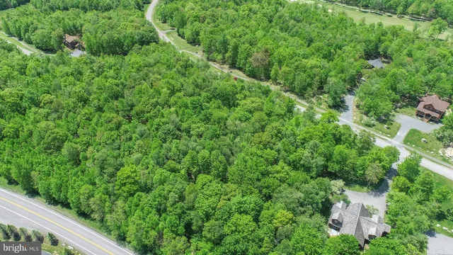 a view of a garden with a building