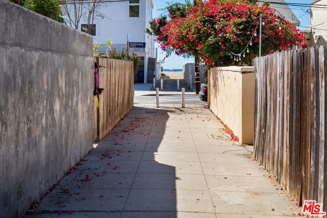 122 Montreal Street Playa del Rey, CA 90293 - Photo 21 of 30 a view of a pathway with a building in the background