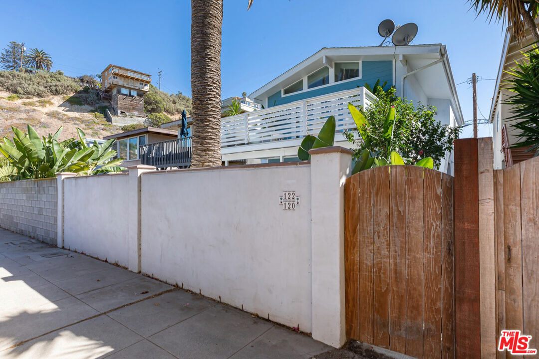 122 Montreal Street Playa del Rey, CA 90293 - Photo 3 of 30 a view of a house with wooden fence