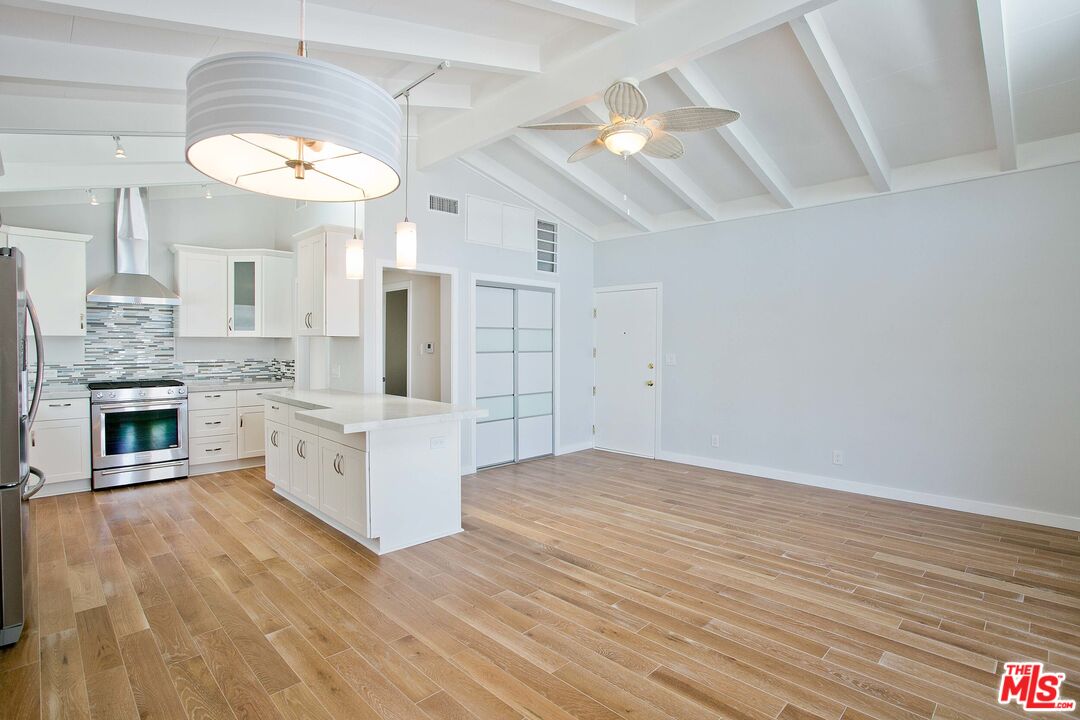 122 Montreal Street Playa del Rey, CA 90293 - Photo 8 of 30 a view of a kitchen cabinets and a fireplace