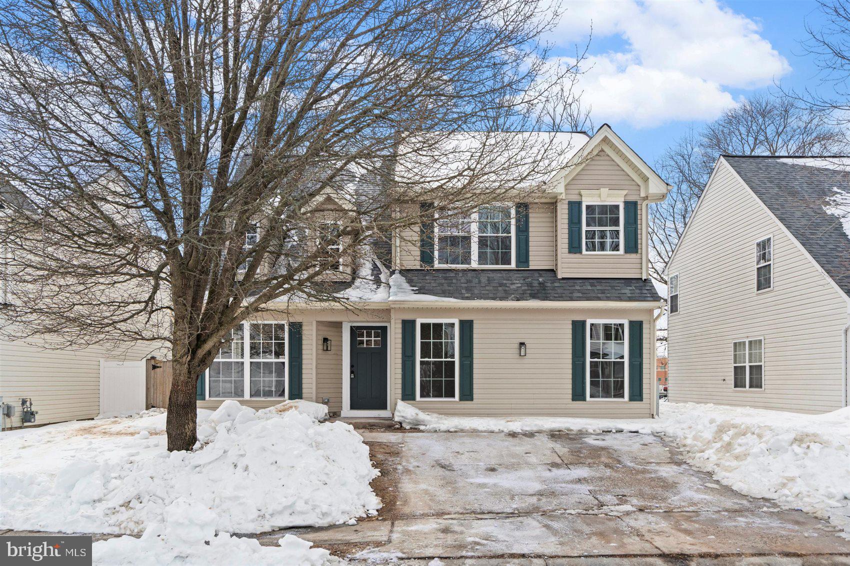 304 Canoe Lane Edgewood, MD 21040 - Photo 2 of 41 a front view of a house with a yard covered in snow