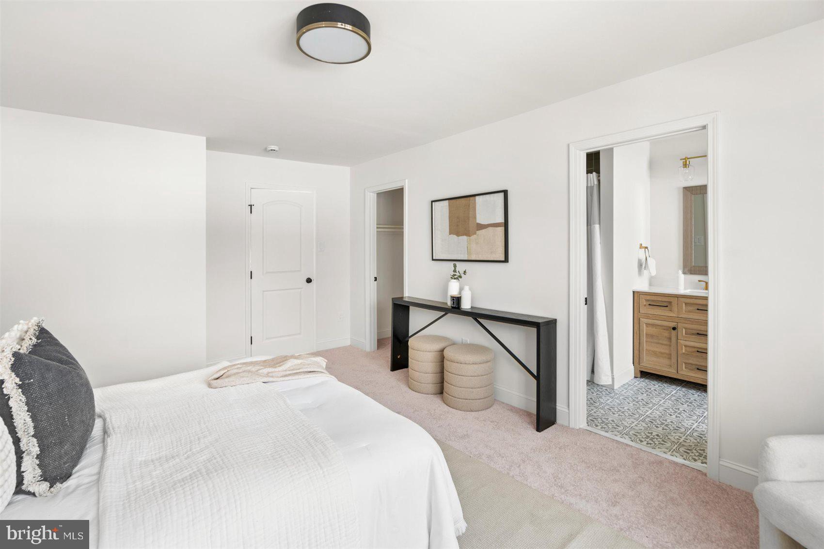 304 Canoe Lane Edgewood, MD 21040 - Photo 30 of 41 a bedroom with a bed and a flat screen tv