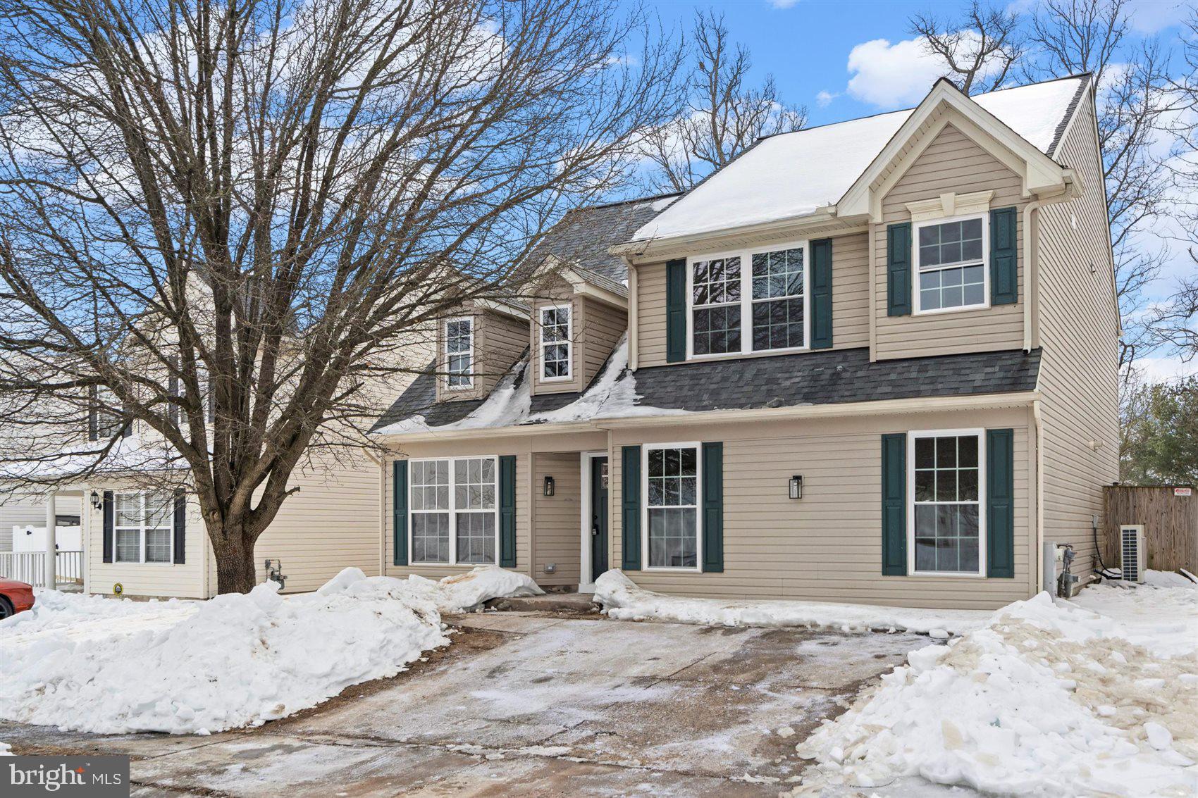 304 Canoe Lane Edgewood, MD 21040 - Photo 3 of 41 a front view of a house with a yard covered in snow