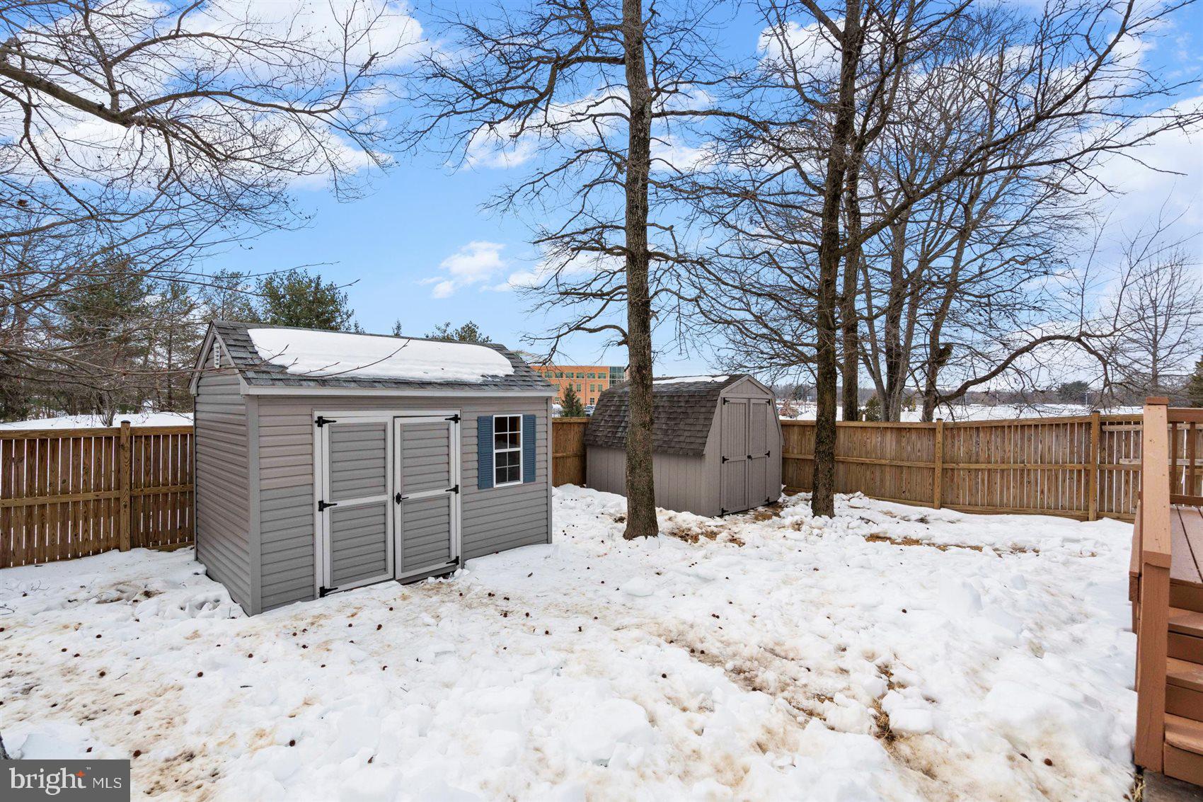 304 Canoe Lane Edgewood, MD 21040 - Photo 7 of 41 a wooden fence covered with snow in front of house