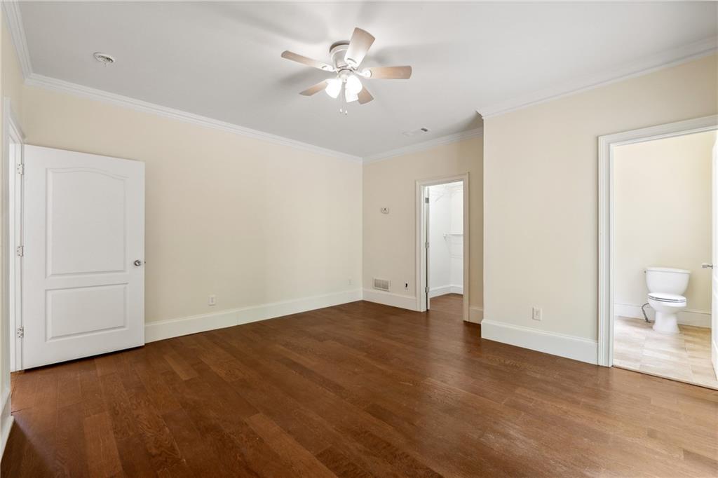 1303 North Druid Hills Road Brookhaven, GA 30319 - Photo 24 of 56 wooden floor in an empty room
