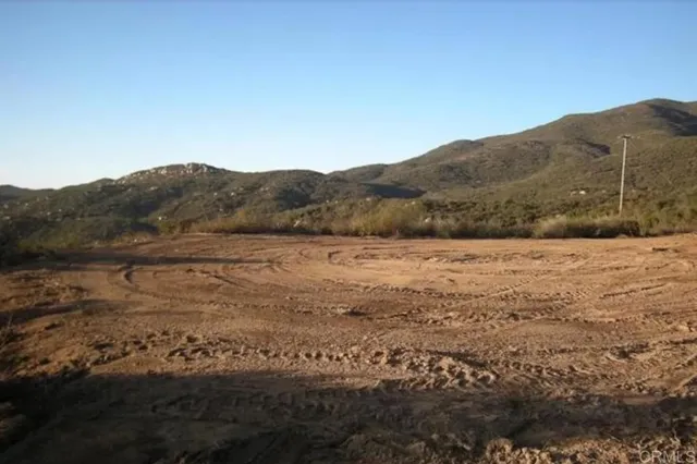 a view of mountain with lake view