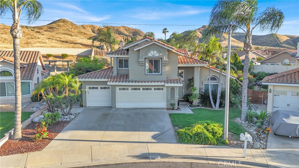 3350 May Court Riverside, CA 92503 - Photo 11 of 55 a house with a yard and a garden