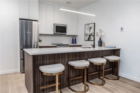 $885,000 | 1395 Washington Street, Unit 207, Boston, MA 02118