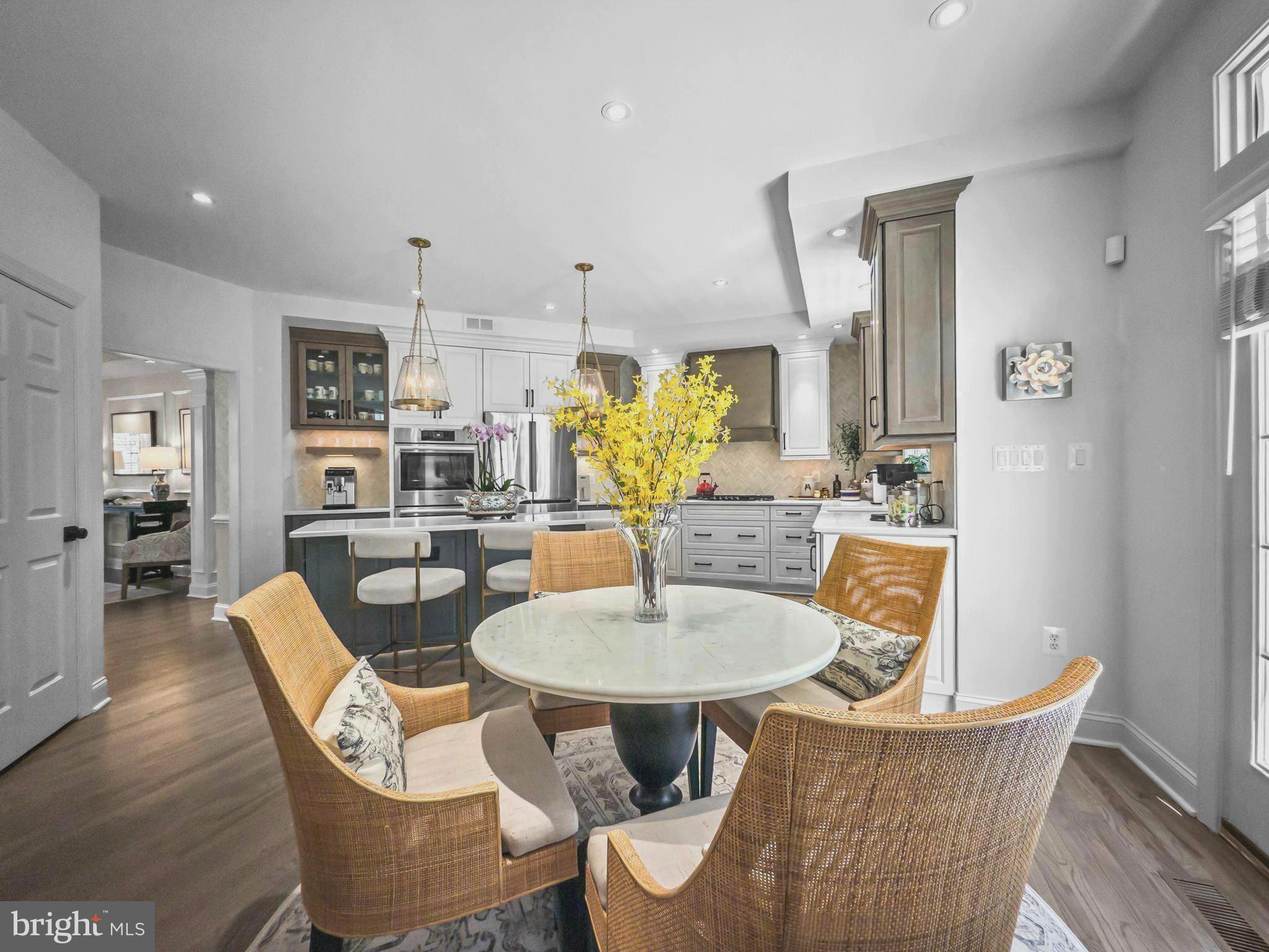 3738 Gleneagles Drive Silver Spring, MD 20906 - Photo 14 of 71 a dining room with furniture and wooden floor