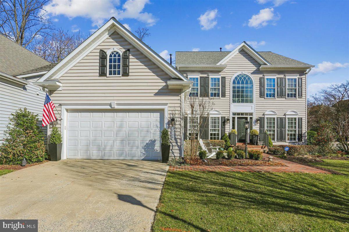 3738 Gleneagles Drive Silver Spring, MD 20906 - Photo 51 of 71 a front view of a house with a yard table and chairs