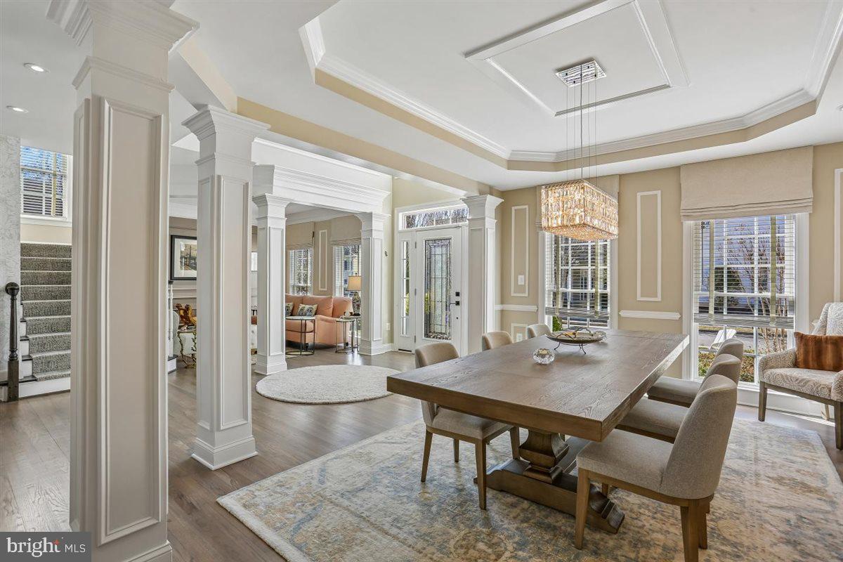 3738 Gleneagles Drive Silver Spring, MD 20906 - Photo 7 of 71 a view of a dining room with furniture and wooden floor