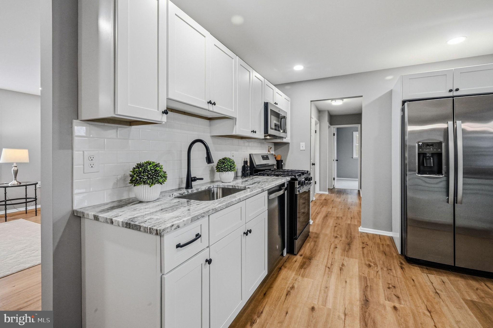 1302 Stanford Road Wilmington, DE 19803 - Photo 11 of 39 Modern kitchen with sleek finishes.
