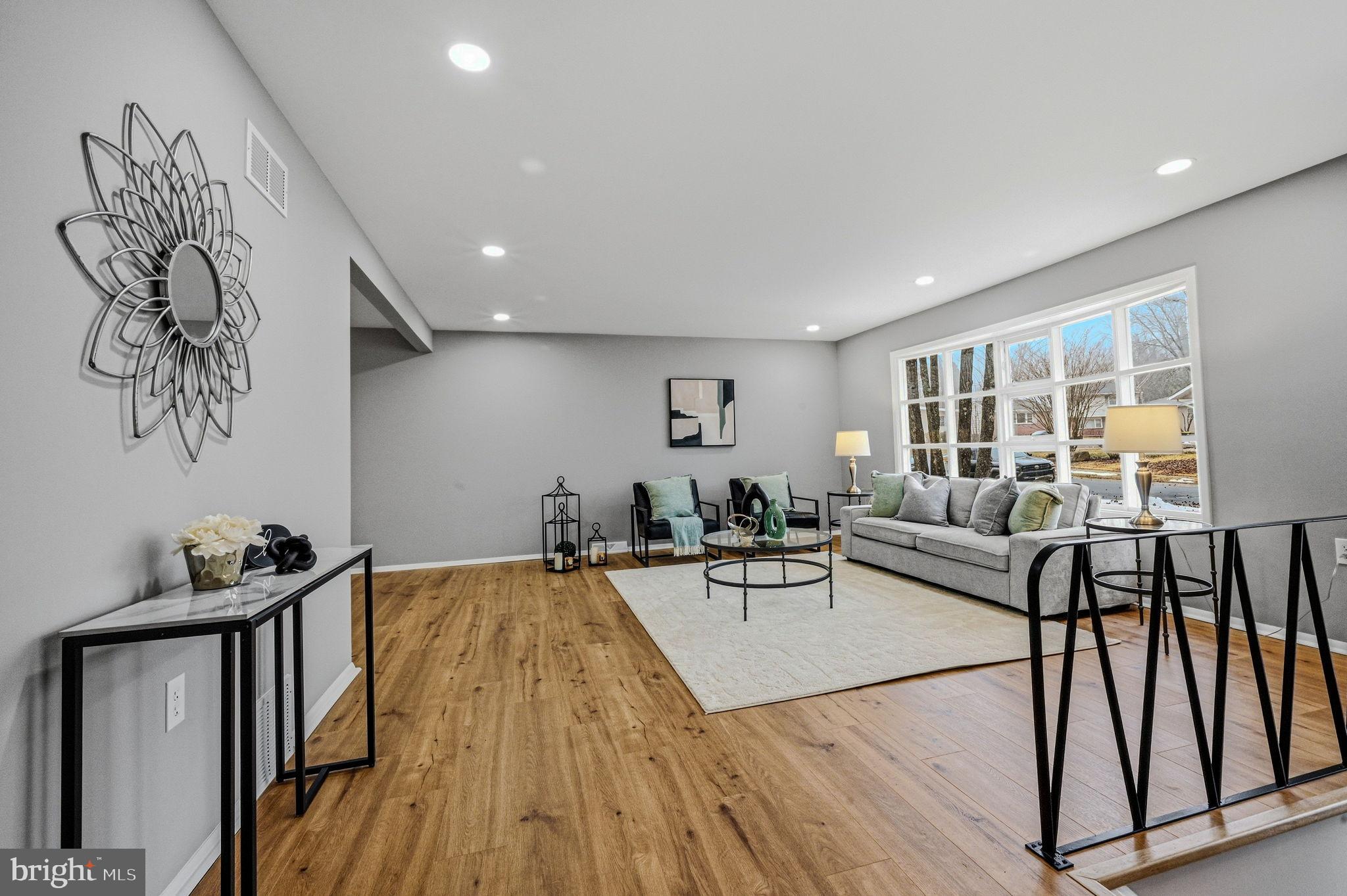 1302 Stanford Road Wilmington, DE 19803 - Photo 17 of 39 Spacious living area with natural light.