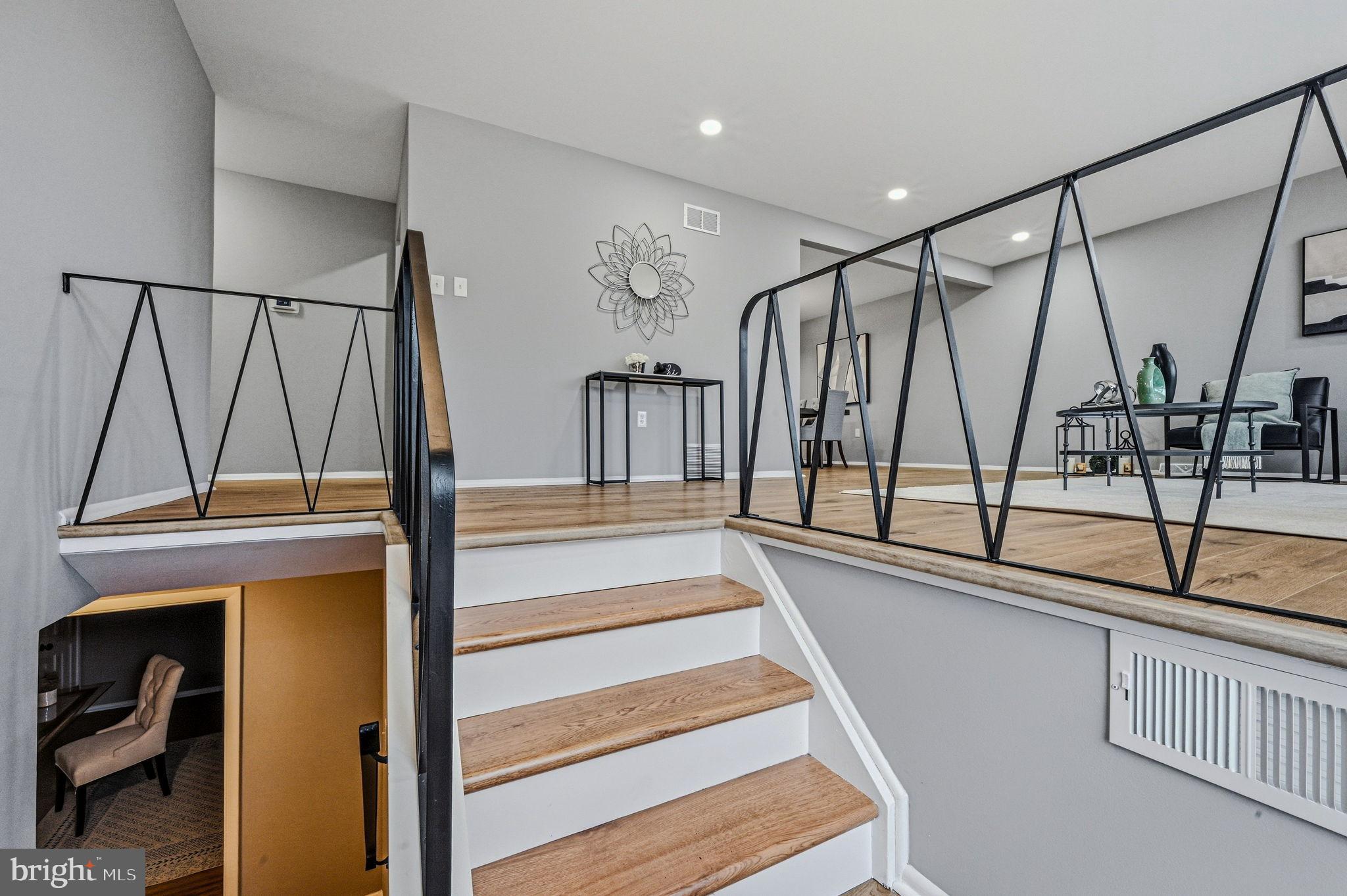 1302 Stanford Road Wilmington, DE 19803 - Photo 20 of 39 Modern staircase with stylish railing design.