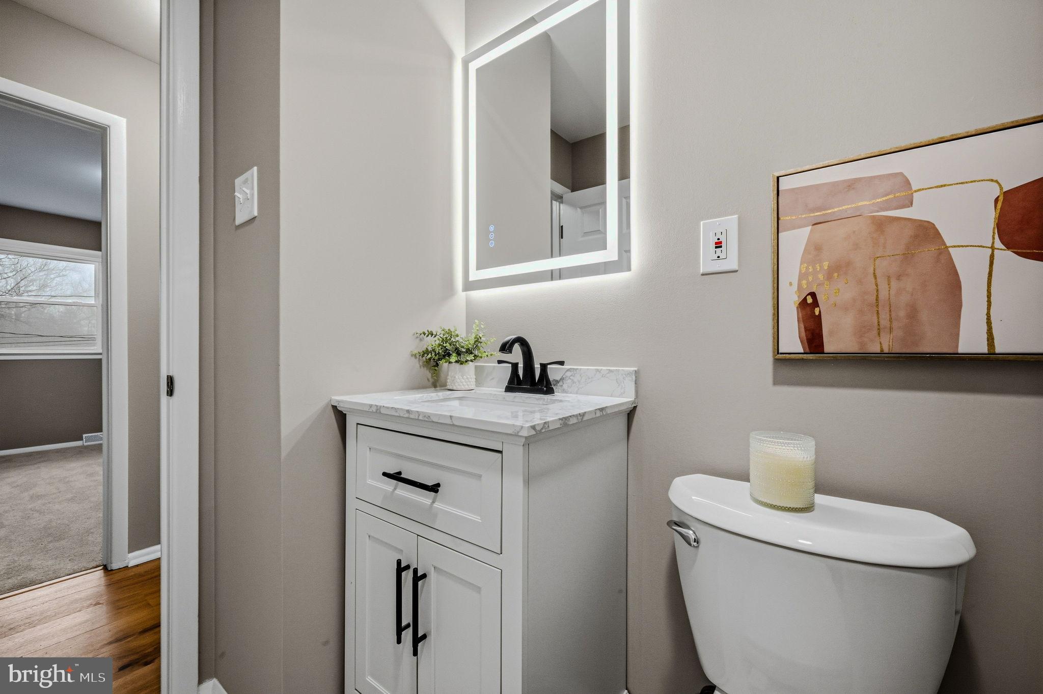 1302 Stanford Road Wilmington, DE 19803 - Photo 23 of 39 Sleek modern bathroom with elegant finishes.
