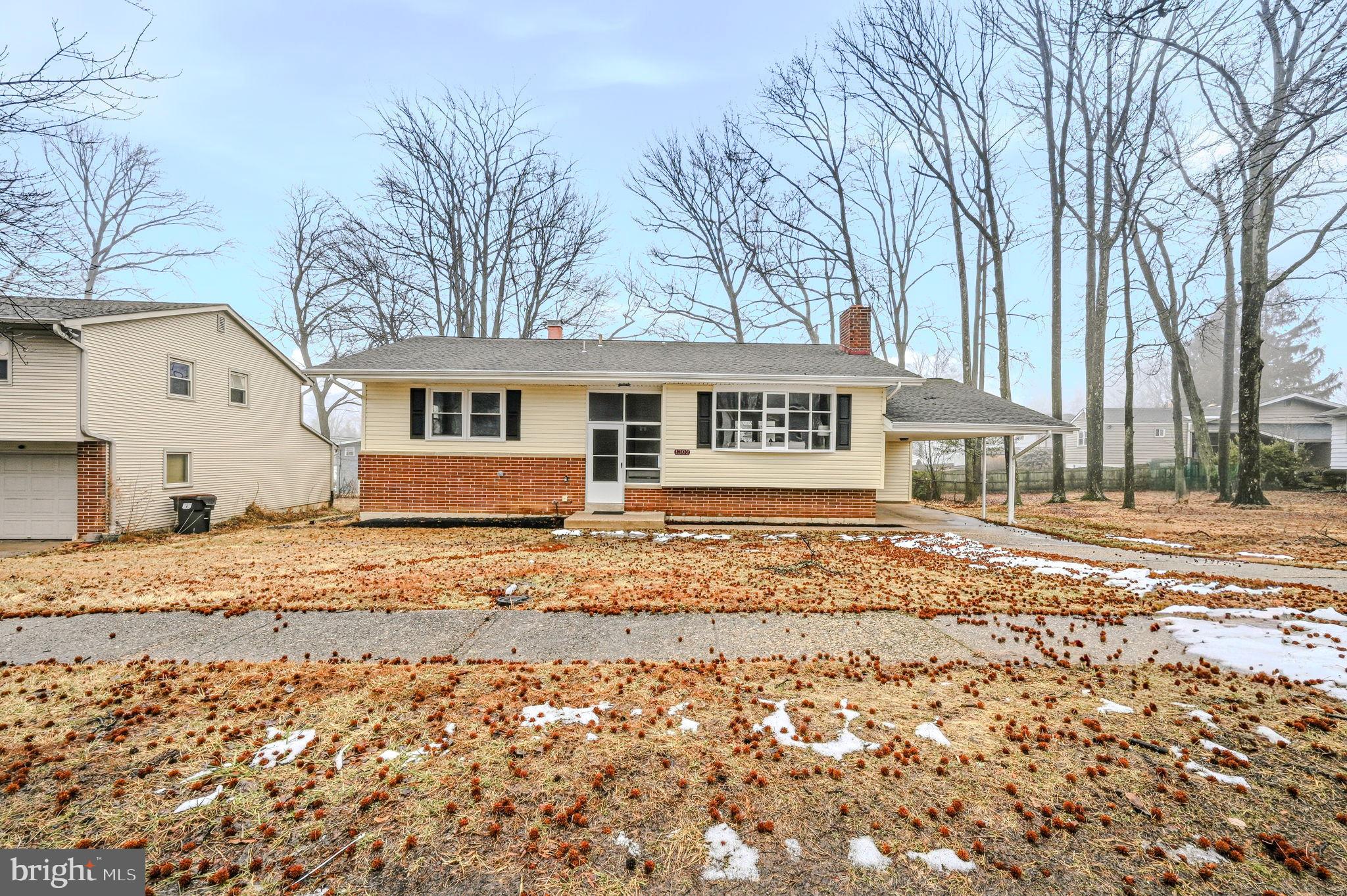 1302 Stanford Road Wilmington, DE 19803 - Photo 3 of 39 Charming home nestled among tall trees.