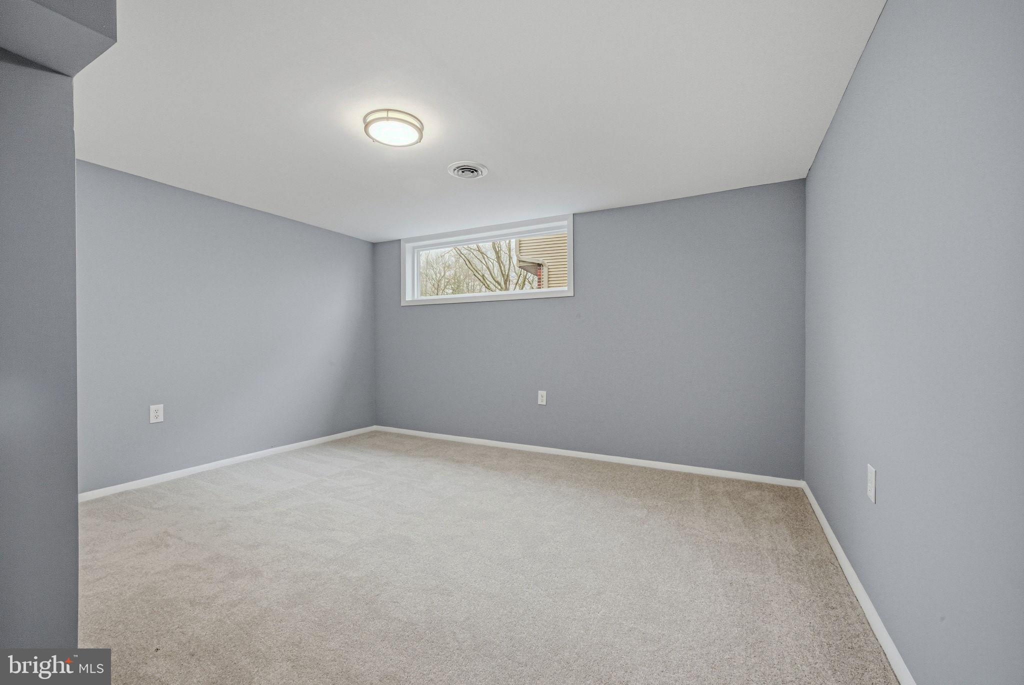 1302 Stanford Road Wilmington, DE 19803 - Photo 37 of 39 Versatile space with soft gray tones.