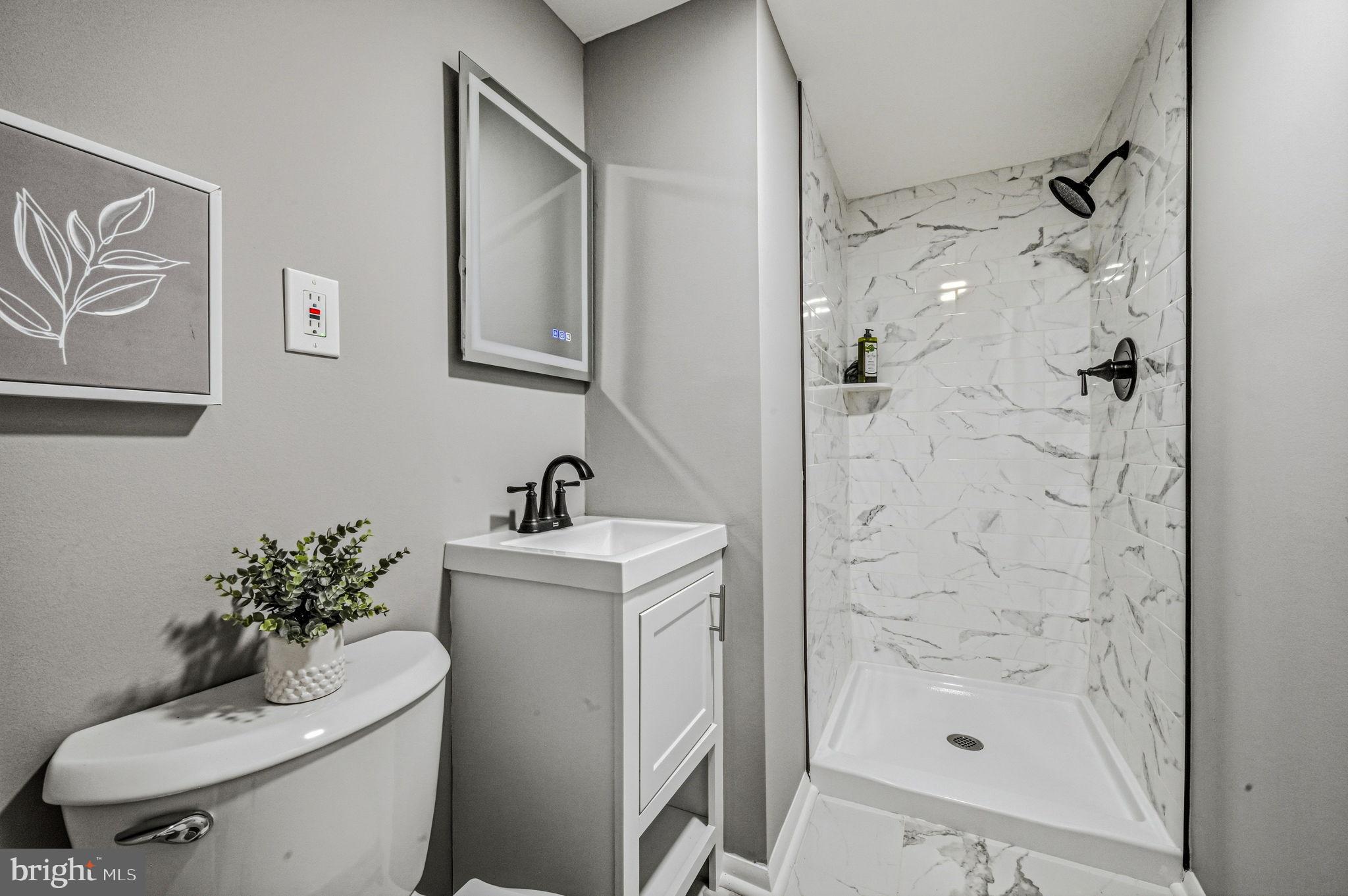 1302 Stanford Road Wilmington, DE 19803 - Photo 39 of 39 Sleek modern bathroom with elegant finishes.