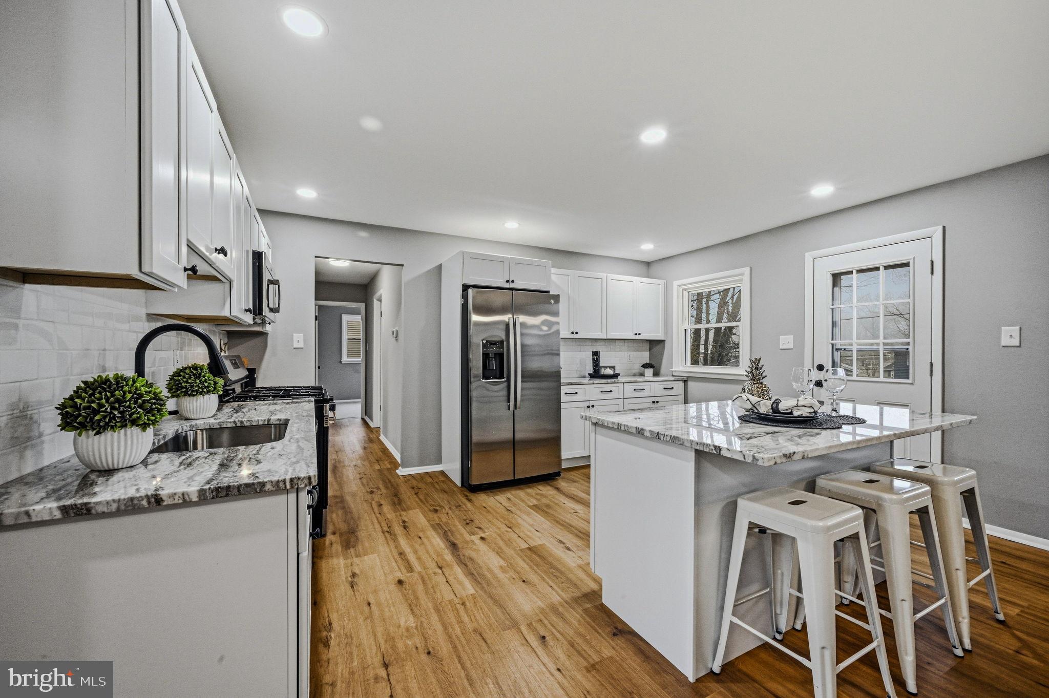 1302 Stanford Road Wilmington, DE 19803 - Photo 9 of 39 Modern kitchen with sleek finishes.